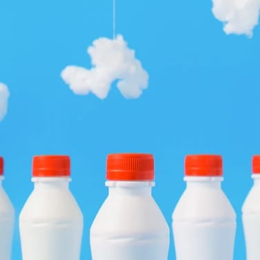a bunch of milk's bottle
